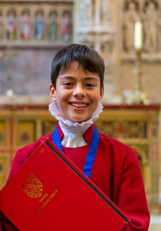 Truro Cathedral Choir's head chorister Oliver Thorpe standing inside the cathedral