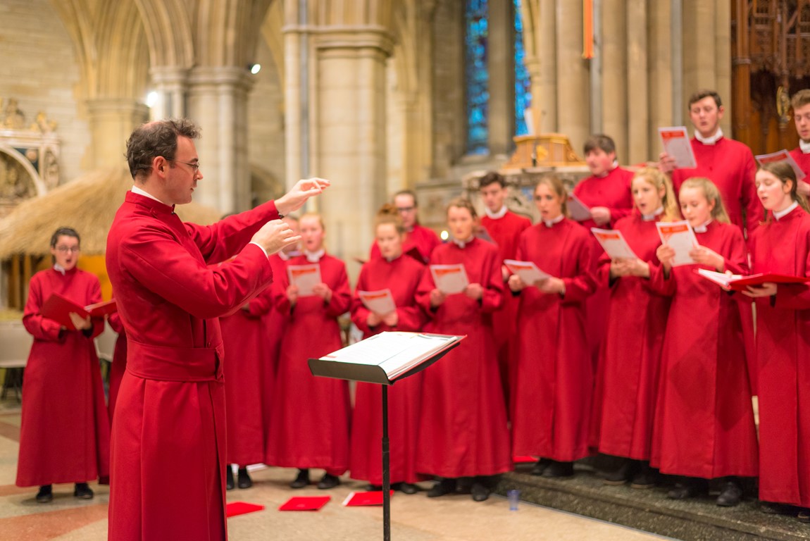 Director of Music Christopher Gray conducting the choir at Truro Cathedral